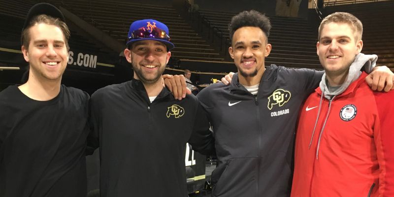 Left to right: Dan Hargrove, Alex Koehler, Derrick White, and Andrew Buckholtz. Koehler and White are wearing gear from the University of Colorado Boulder, while Buckholtz is wearing a USA Paralympics jacket. Hargrove is wearing a black T-shirt.
