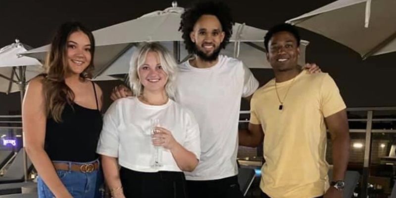 Left to right: Latesha Anderson, Hannah White, Derrick White, and Tommie Anderson. All four adults are wearing casual attire.